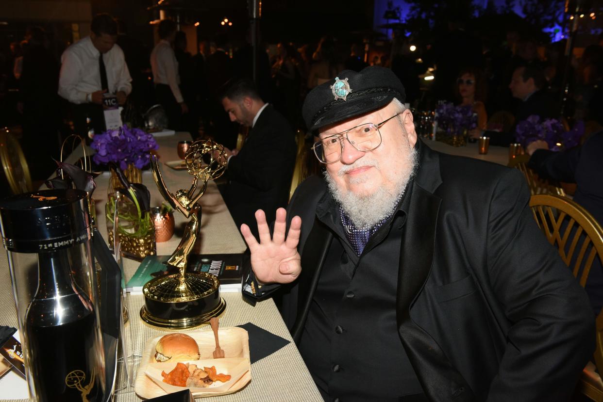 US novelist George R.R. Martin poses with the Emmy for Outstanding Drama Series 