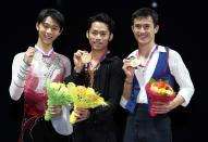 SOCHI, RUSSIA - DECEMBER 08: (L-R) Yuzuru Hanyu of Japan with his silver medal, Daisuke Takahashi of Japan with his gold medal and Patrick Chan of Canada with his bronze medal after the Mens Free Skating during the Grand Prix of Figure Skating Final 2012 at the Iceberg Skating Palace on December 8, 2012 in Sochi, Russia. (Photo by Julian Finney/Getty Images)