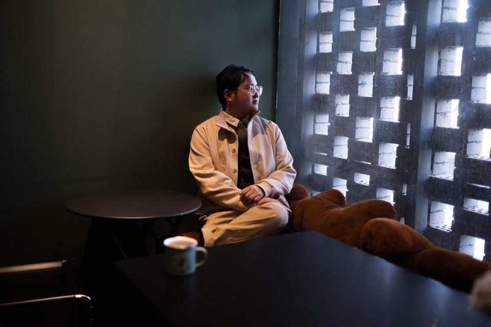 Wang Zichen, a former cafe owner, at SIP coffee in Beijing. (Fred Dufour / NBC News)