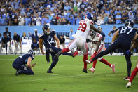 Tennessee Titans place kicker Randy Bullock (14) misses a field goal during the second half of an NFL football game against the New York Giants Sunday, Sept. 11, 2022, in Nashville. The Giants won 21-20. (AP Photo/Mark Zaleski)