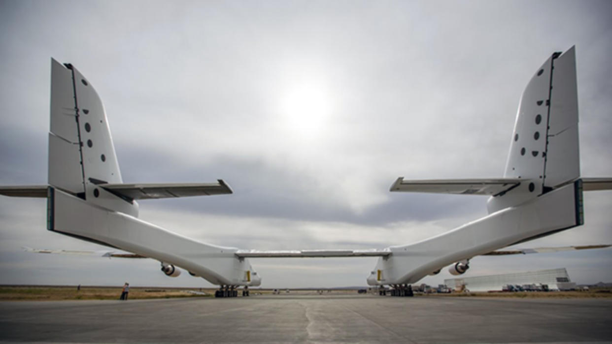 Stratolaunch’s plane is a six-engine, twin-fuselage airplane — the largest ever built by wingspan