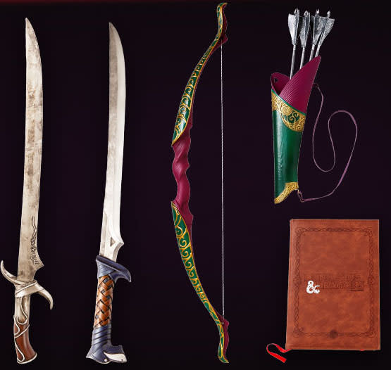 Two blades, a bow, a pouch of arrows, and a notebook.