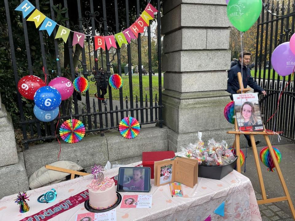 A birthday spread on a table at the entrance to St Stephen's Green in Dublin for Irish-Israeli girl Emily Hand (PA)