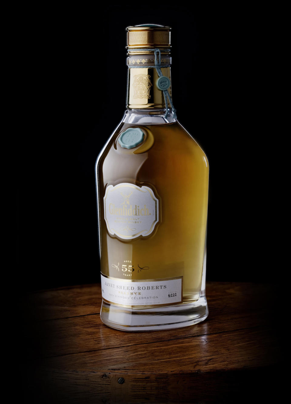 In this undated photo released by Glenfiddich , is a rare bottle of 55-year-old single malt whisky which has set a new world record when it was sold at auction, auctioneers said. The bottle of Glenfiddich Janet Sheed Roberts Reserve fetched 46,850 pounds (US dollars 72,521) at Bonhams auctioneers in Edinburgh Wednesday, Dec. 14 2011.ÅIt is the first of 11 bottles of the 1955 tipple to be released to the public to honour Janet Sheed Roberts, the granddaughter of William Grant who founded the Glenfiddich distillery. (AP Photo / Glenfiddich)