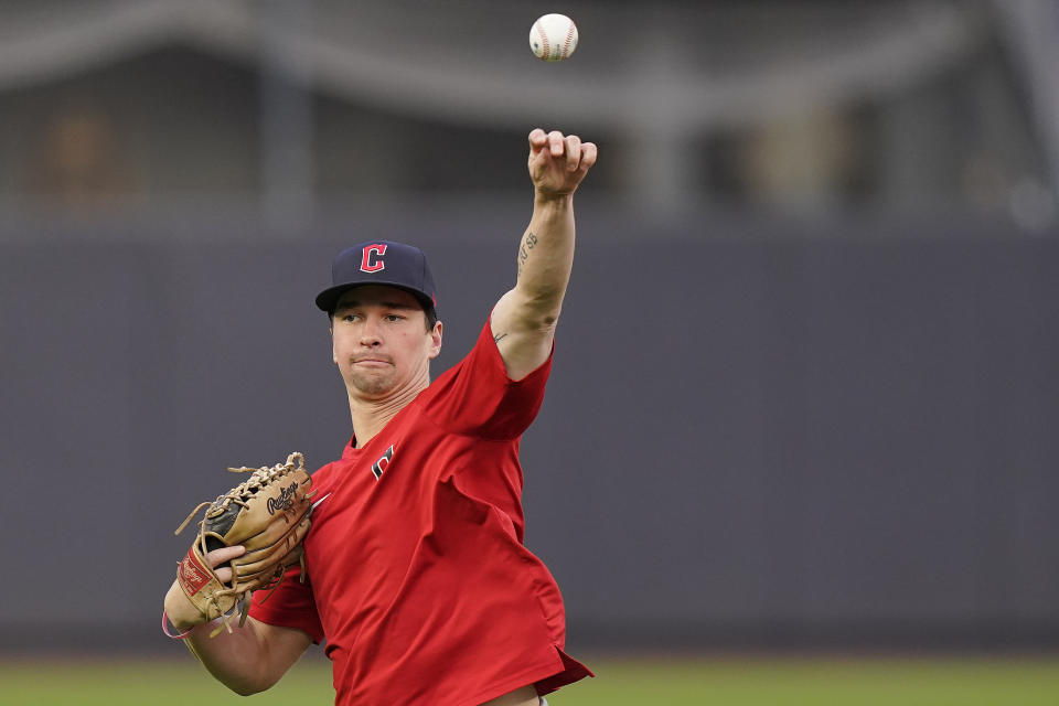 Cleveland Guardians outfielder Will Brennan warms up before Game 5 of an American League Division baseball series against the New York Yankees, Monday, Oct. 17, 2022, in New York. (AP Photo/Frank Franklin II)