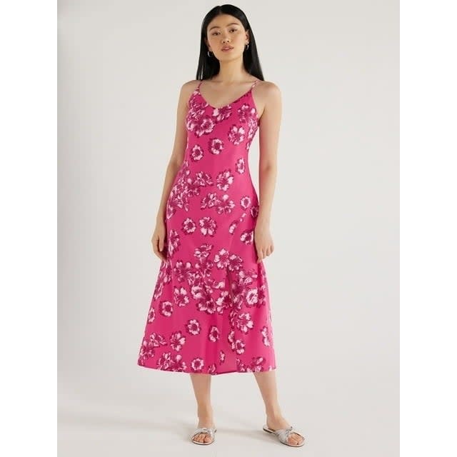 Model wearing pink floral satin slip midi dress