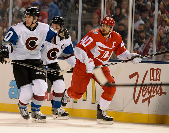 DENVER, CO - FEBRUARY 27: Detroit Red Wings left wing Henrik Zetterberg (40) skates down ice with Colorado Avalanche left wing Alex Tanguay (40) during the second period February 27, 2016 at Coors Field. (Photo By John Leyba/The Denver Post via Getty Images)