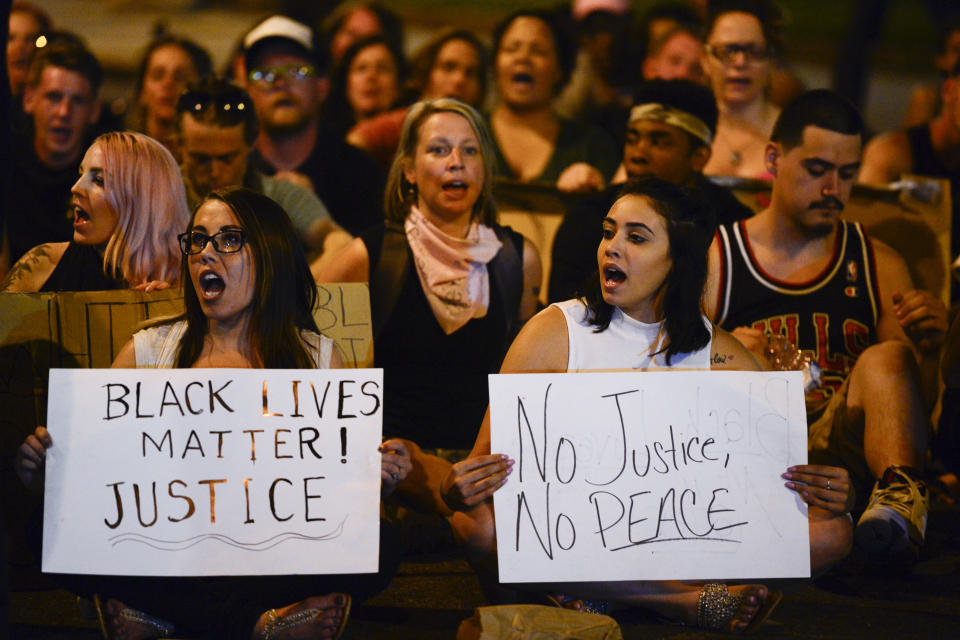 Protesters chant during a sit-in on Lincoln Avenue in solidarity with the Black Lives Matter movement in New York City.