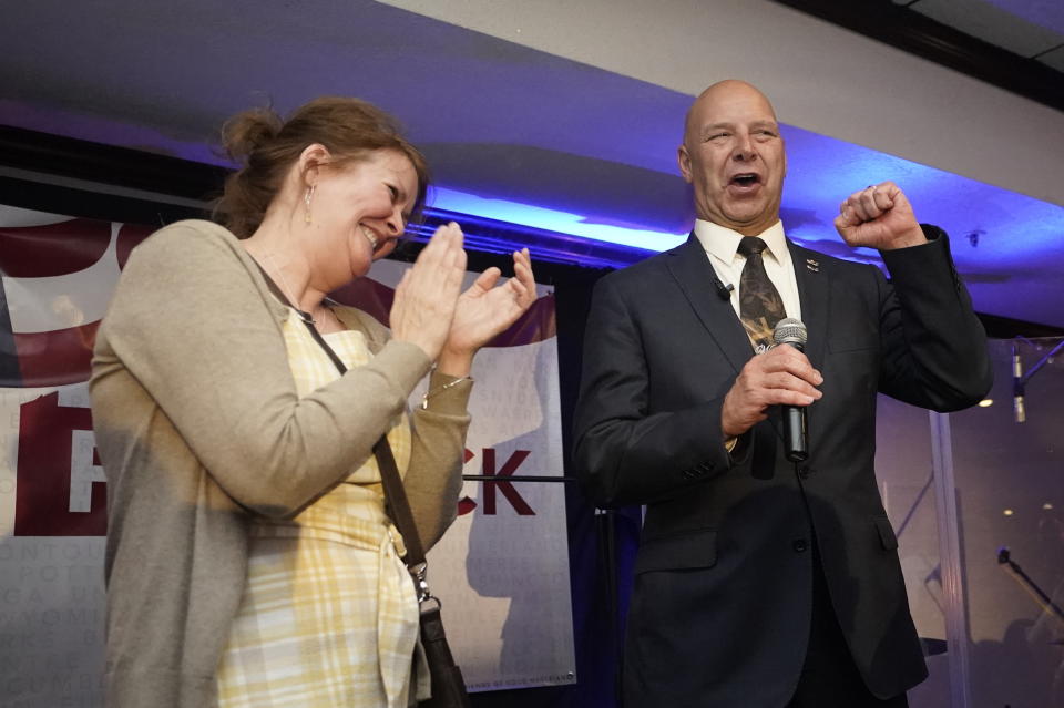 Rebbeca Mastriano reacts as her husband State Sen. Doug Mastriano, R-Franklin, a Republican candidate for Governor of Pennsylvania, speaks at a primary night election gathering in Chambersburg, Pa., Tuesday, May 17, 2022. (AP Photo/Carolyn Kaster)