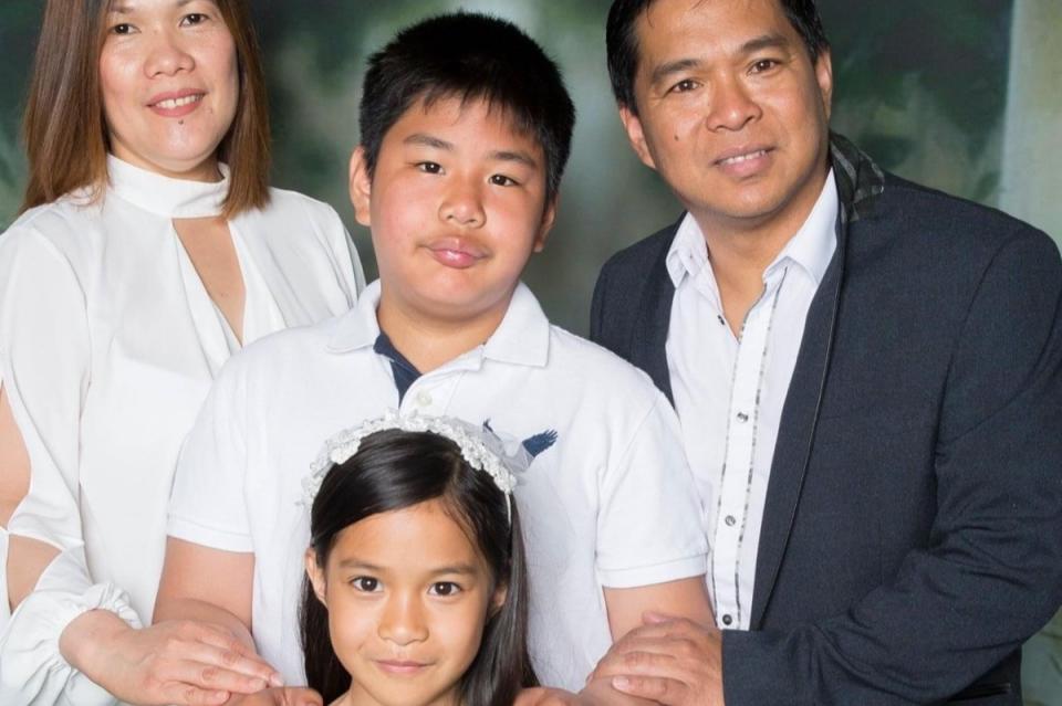 Dax Daantos (right) with his wife Arlene (left) son Jozeph (upper centre) and Daxene (lower centre) (Family handout)