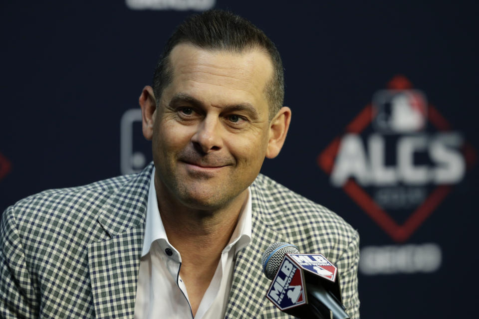 New York Yankees manager Aaron Boone talks with the media during a news conference for a baseball American League Championship Series in Houston, Friday, Oct. 11, 2019. New York will face the Houston Astros, Saturday. (AP Photo/Eric Gay)