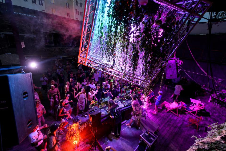 Revellers dance at a rave party in central Kyiv, Ukraine August 27, 2022.