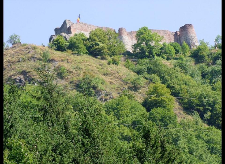 According to legend, Vlad's first wife killed herself by jumping from the castle's tower during an Ottoman siege around 1462. She is believed to have said she'd rather rot than be captured by the Turks.     Poenari Castle is <a href="http://maps.google.com/maps?saddr=Bucharest,+Bucuresti,+Romania&daddr=C%C4%83p%C4%83%C5%A3%C3%A2nenii+P%C4%83m%C3%A2nteni,+Romania&hl=en&ie=UTF8&sll=44.093996,25.575485&sspn=0.396983,0.617294&geocode=Fc8QpgId1zaOASlPrTy_OvmxQDEoppx84zIGrA%3BFZp4swIdBhF4ASmRO7YmyidNRzF9jM-tOrOY0g&vpsrc=0&mra=ls&t=m&z=9" target="_hplink">located two hours from Bucharest</a>. Be prepared to climb 1,462 steps to access the castle ruins.    Photo: <a href="http://www.flickr.com/photos/cosmin_coco_ro/2725685513/" target="_hplink">Coco_ro</a>/Flickr