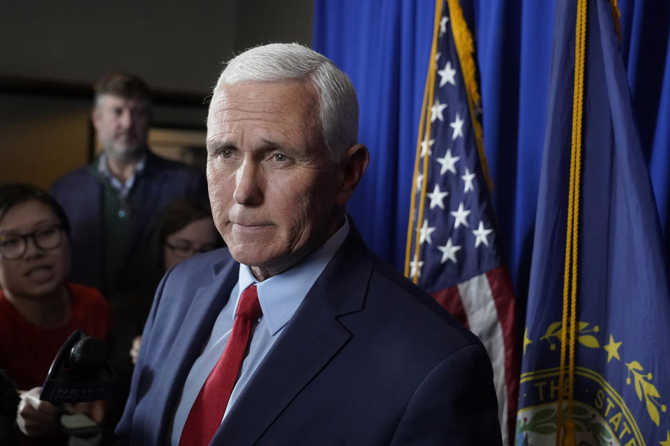 FILE - Former Vice President Mike Pence faces reporters after making remarks at a GOP fundraising dinner, March 16, 2023, in Keene, N.H. Top Republicans, including some of former President Donald Trump’s potential rivals for the party’s nomination, rushed to his defense on Saturday after Trump said he is bracing for possible arrest. “Well, like many Americans, I’m just, I’m taken aback,” said Pence, who is widely expected to launch a campaign in the coming weeks and has been escalating his criticism of Trump. (AP Photo/Steven Senne, File)