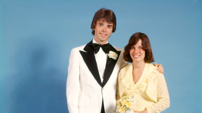 1970s TEEN COUPLE DRESSED...