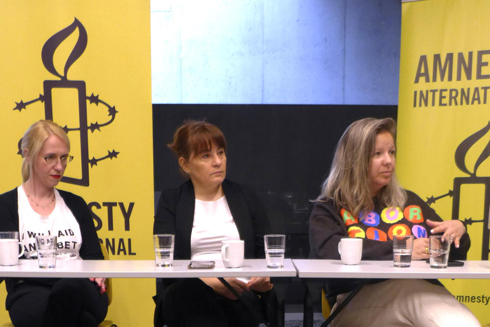 From left, members of the organization Abortion Dream Team Kinga Jelinska, Justyna Wydrzynska and Natalia Broniarczyk speak during a media conference in Brussels, Thursday, March 23, 2023. Justyna Wydrzynska, a women's rights activist, was recently convicted by a Warsaw court for helping a pregnant victim of domestic violence access abortion pills in Poland, sentencing her to eight months of community service. The case has been closely watched by human rights activists, who believe it would set a precedent in a country with some of Europe's most restrictive abortion legislation. (AP Photo/Lorne Cook)