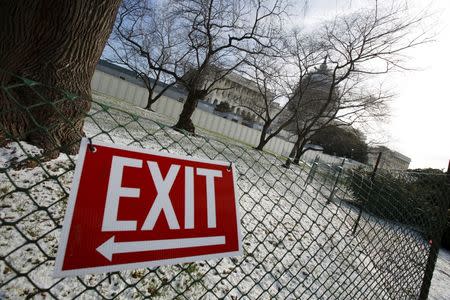 An exit sign is seen outside the U.S. Capitol in Washington, January 21, 2016. REUTERS/Carlos Barria