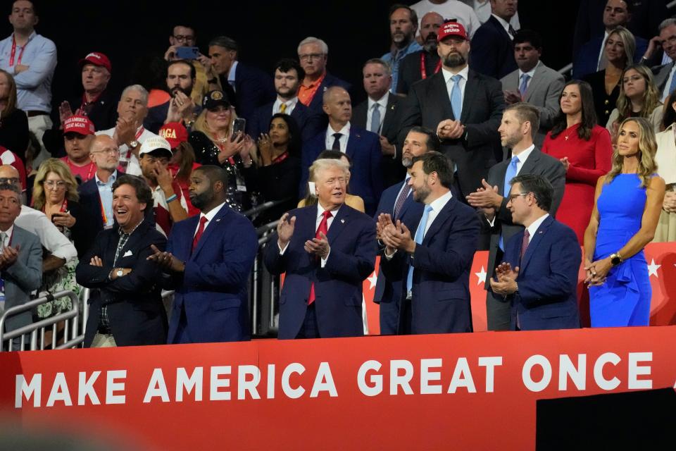 Republican presidential candidate Donald Trump appears with vice presidential candidate JD Vance during the Republican National Convention on Monday (AP)