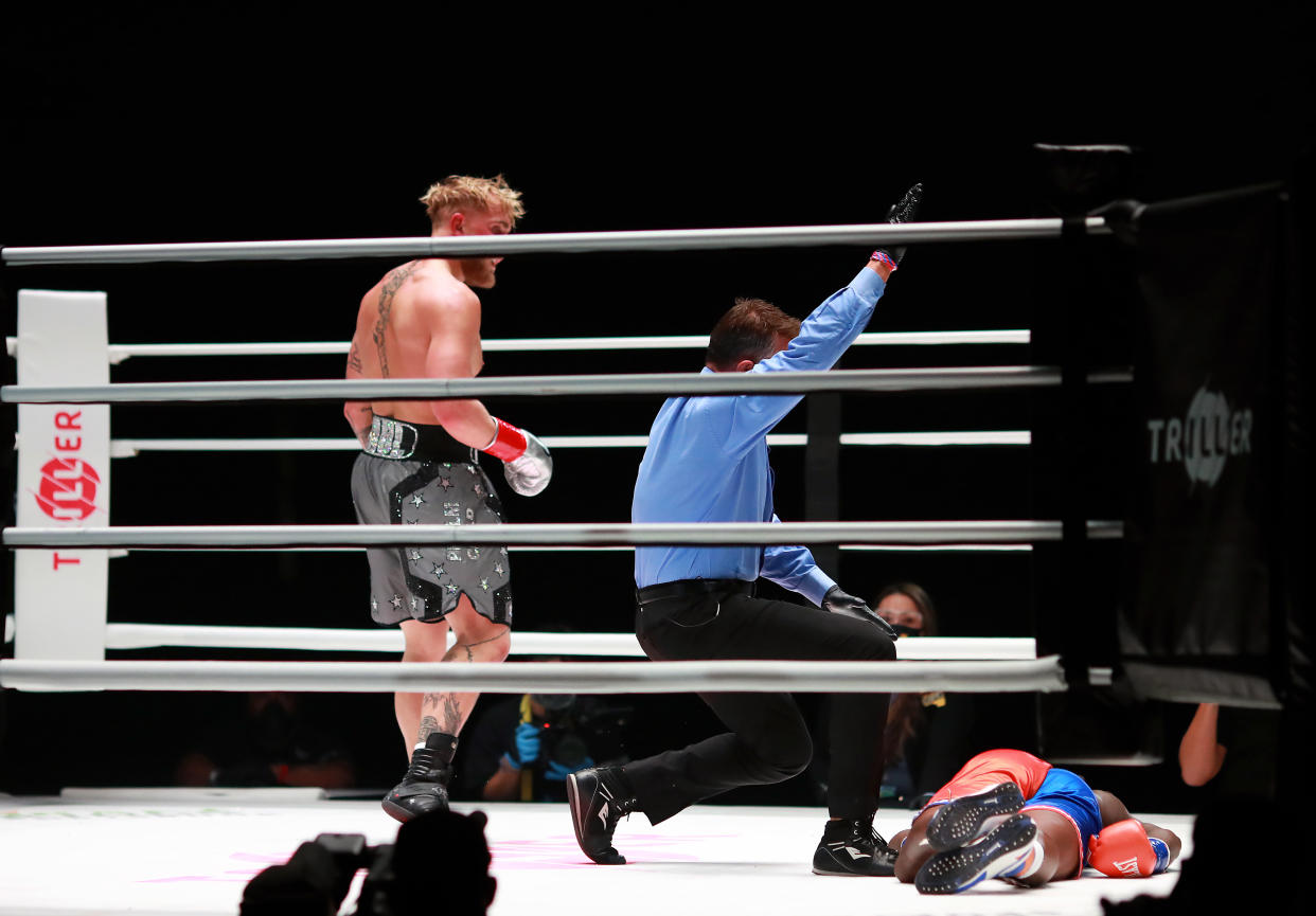 LOS ANGELES, CALIFORNIA - NOVEMBER 28: Jake Paul reacts over his knockout victory against Nate Robinson in the second round during Mike Tyson vs Roy Jones Jr. presented by Triller at Staples Center on November 28, 2020 in Los Angeles, California. (Photo by Joe Scarnici/Getty Images for Triller)