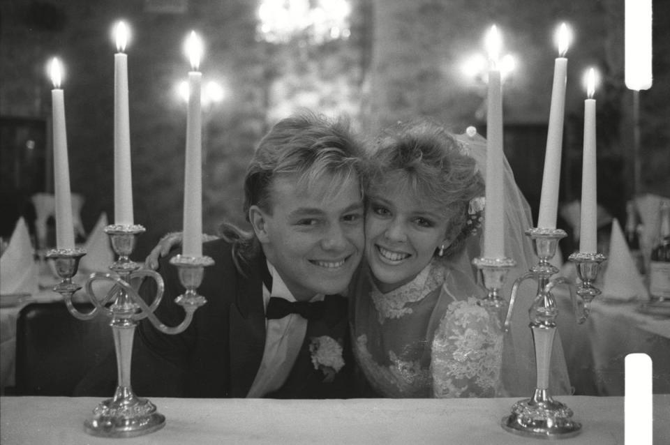 The original Ross & Rachel: Jason Donovan and Kylie Minogue on the set of ‘Neighbours’ in 1987 (John Lamb/Shutterstock)