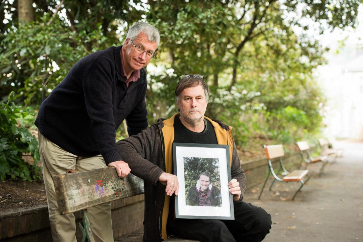 <span>Jeff McKinnon and Stephen Avery remember Daniel Tommerup, a rough sleeper in Launceston who died after setting himself alight while cooking.</span><span>Photograph: Sarah Rhodes/The Guardian</span>