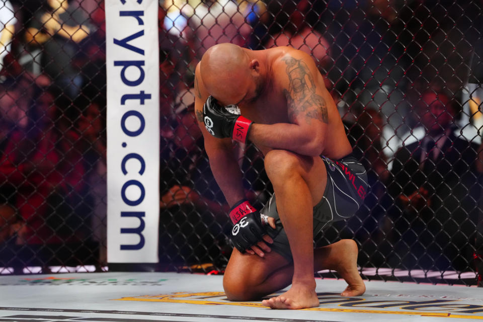 Jul 8, 2023; Las Vegas, Nevada, USA; Robbie Lawler (red gloves) reacts to defeating Niko Price (blue gloves) during UFC 290 at T-Mobile Arena. Mandatory Credit: Stephen R. Sylvanie-USA TODAY Sports