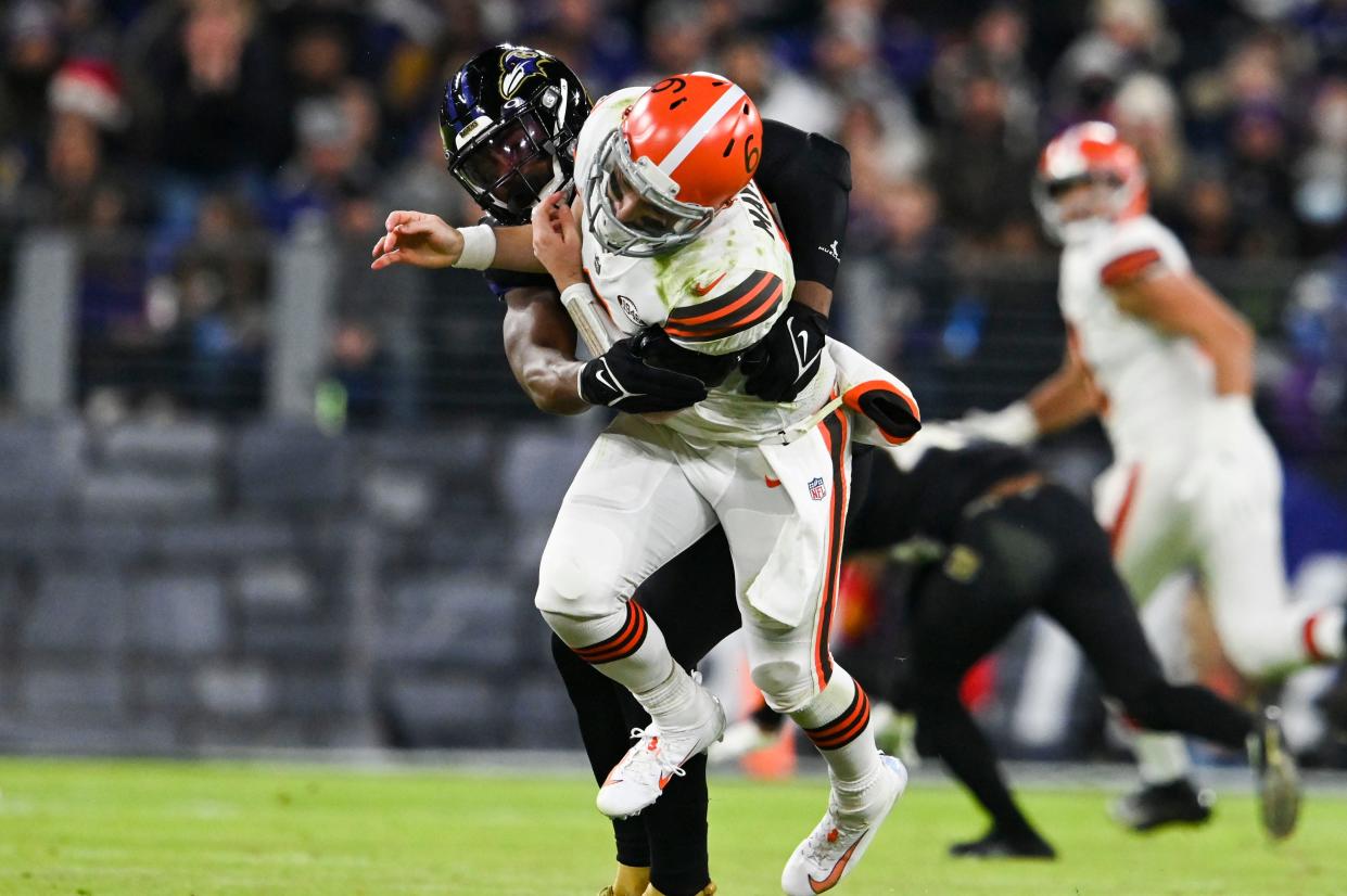 Nov 28, 2021; Baltimore, Maryland, USA;  Baltimore Ravens outside linebacker Tyus Bowser (54) hits Cleveland Browns quarterback Baker Mayfield (6) after the throw during the third quarter at M&T Bank Stadium. Mandatory Credit: Tommy Gilligan-USA TODAY Sports