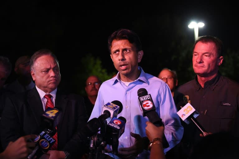 Governor Bobby Jindal speaks to the media in front of Johnston Street Java near the Grand Theatre on July 23, 2015 in Lafayette, Louisiana where a gunman shot two people dead before killing himself