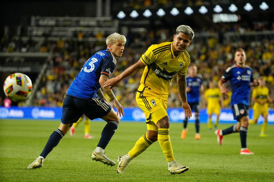 May 11, 2024; Columbus, OH, USA; Columbus Crew forward Cucho Hernandez (9) loses the ball in front of FC Cincinnati forward Luca Orellano (23) during the second half of the MLS soccer game at Lower.com Field. The Crew lost 2-1.