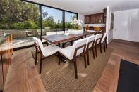 <p>The dining area opens to the yard, too. (Photo: <a href="http://bit.ly/1UCMKf2" rel="nofollow noopener" target="_blank" data-ylk="slk:Sotheby’s International Realty via Catherine Marcus;elm:context_link;itc:0;sec:content-canvas" class="link ">Sotheby’s International Realty via Catherine Marcus</a>, shot by Mark Lee)</p>