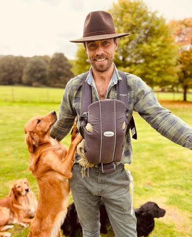 <p>James Middleton Instagram</p> James Middleton a photo with baby Inigo and two of the family dogs on Oct. 27.