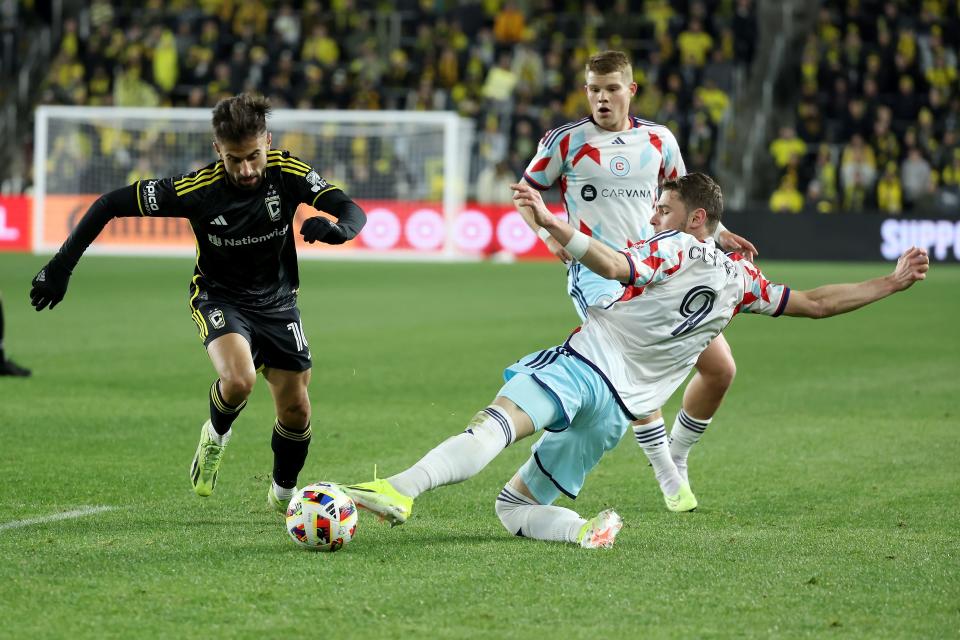 COLUMBUS, OHIO - MARCH 09: Hugo Cuypers #9 of the Chicago Fire FC attempts to steal the ball from Diego Rossi #10 of the Columbus Crew during the second half of the match at Lower.com Field on March 9, 2024 in Columbus, Ohio. Columbus defeated Chicago 2-1. (Photo by Kirk Irwin/Getty Images)