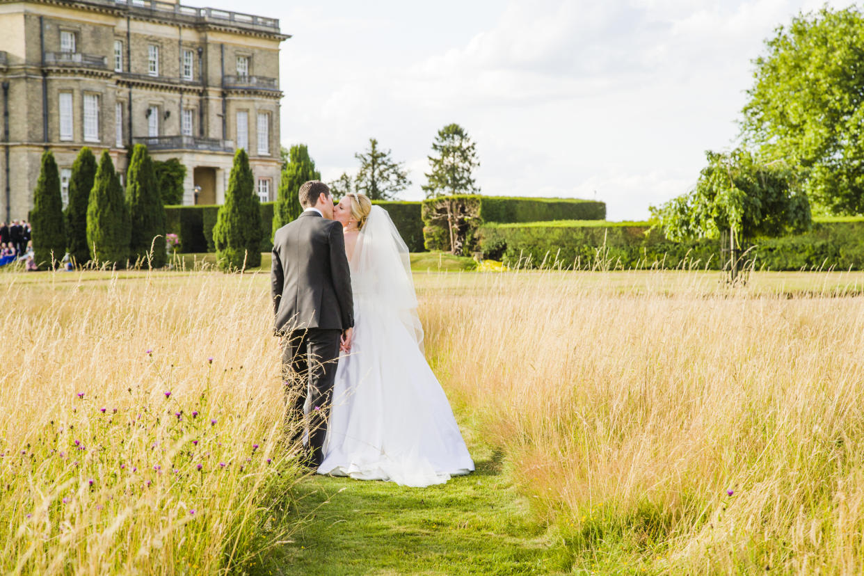 A bride has divided the Internet by requesting her guests pay £180 to secure their place at the wedding [Photo: Getty]