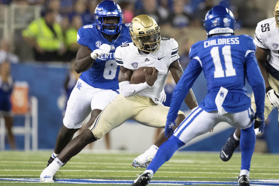 Akron quarterback DJ Irons (0) runs the ball against Kentucky during the first half of an NCAA college football game in Lexington, Ky., Saturday, Sept. 16, 2023. (AP Photo/Michelle Haas Hutchins)