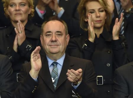 Scotland's First Minister Alex Salmond applauds during the opening ceremony of the 40th Ryder Cup, at Gleneagles in Scotland September 25, 2014. REUTERS/Toby Melville/Files