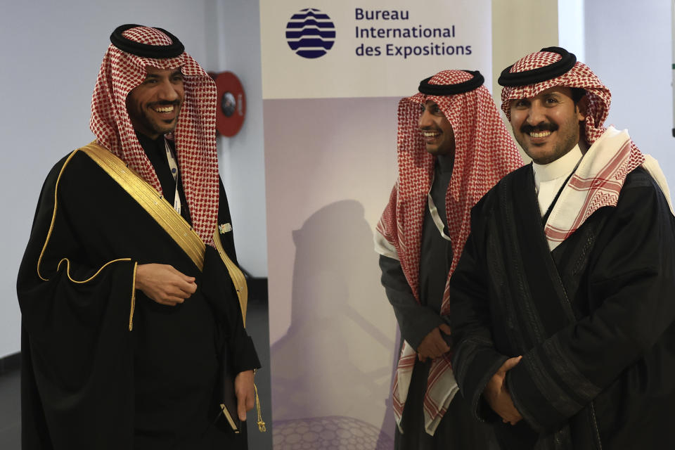 Members of the Saudi Arabia delegation gather shortly before the vote at the Bureau International des Expositions or BIE, Tuesday, Nov. 28, 2023 in Issy-les-Moulineaux, outside Paris. Saudi Arabia's capital Riyadh was chosen to host the 2030 World Expo, beating out South Korean port city Busan and Rome for an event expected to draw millions of visitors. (AP Photo/Aurelien Morissard)