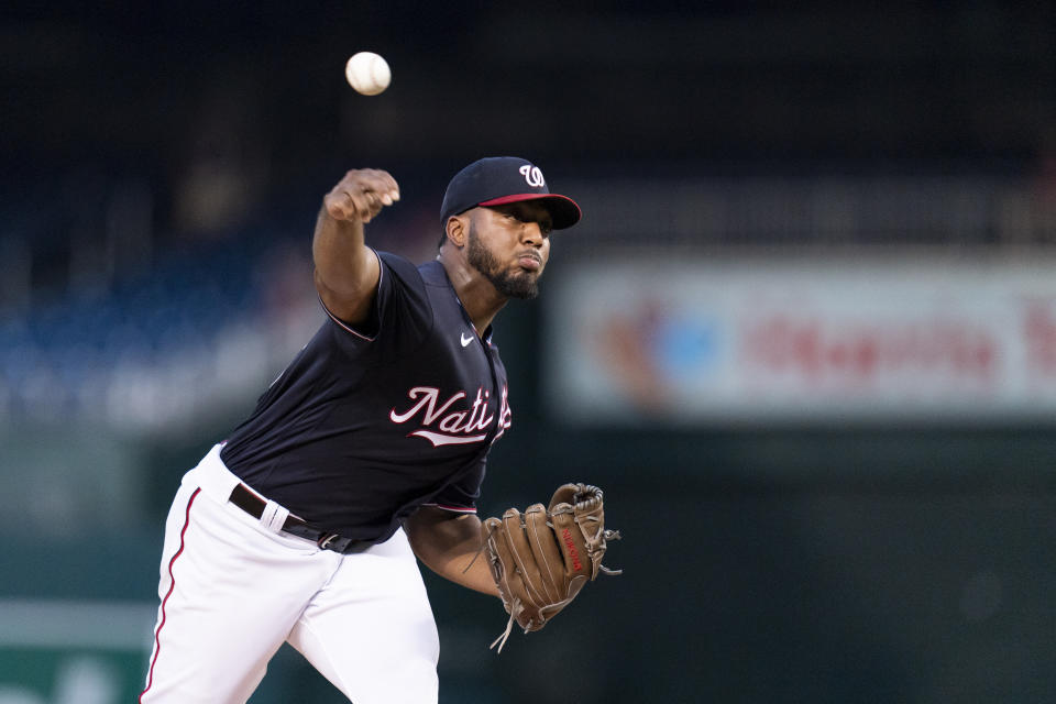 Washington Nationals starting pitcher Joan Adon delivers during the second inning of a baseball game against the New York Mets, Wednesday, Sept. 6, 2023, in Washington. (AP Photo/Stephanie Scarbrough)