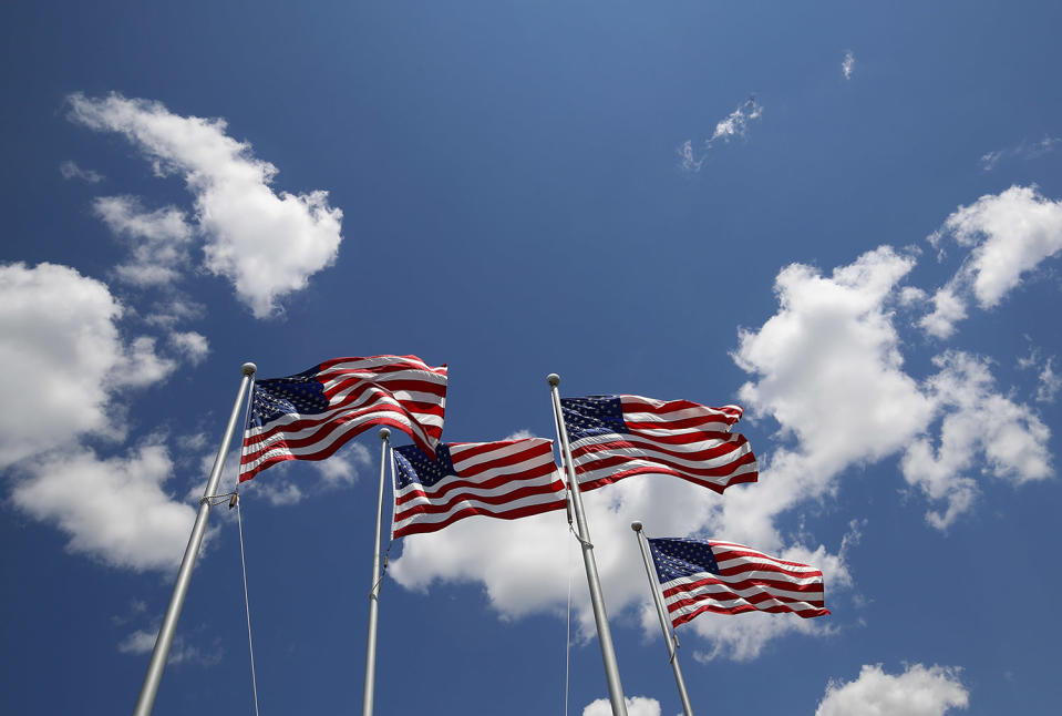 <p>American flags fly outside of the FlagSource facility in Batavia, Illinois, U.S., on Tuesday, June 27, 2017. (Photo: Jim Young/Bloomberg via Getty Images) </p>