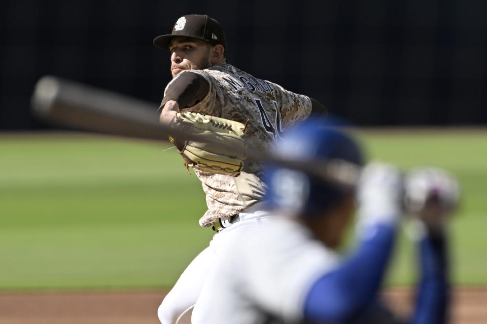San Diego Padres starting pitcher Joe Musgrove throws to a Los Angeles Dodgers batter during the first inning of a baseball game in San Diego, Sunday, May 7, 2023. (AP Photo/Alex Gallardo)