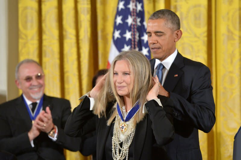 Barbra Streisand receives the Medal of Freedom from president Barack Obama in 2015. File Photo by Kevin Dietsch/UPI