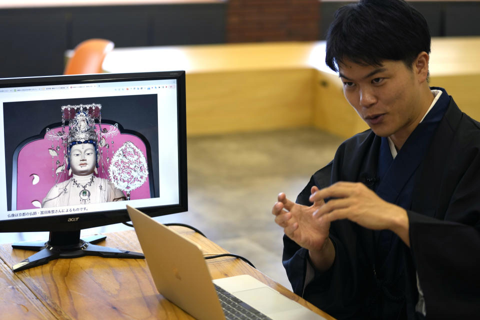 Ryo Yoshida, head of his company, Do The Samurai, speaks during an interview with The Associated Press, in Tokyo, on Aug. 17, 2023. His company operates “Hotokami,” an internet information site on shrines and temples. (AP Photo/Shuji Kajiyama)