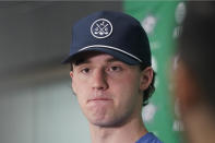 Dallas Stars goalie Jake Oettinger pauses while speaking to reporters about the NHL hockey season during a media availability at the team's headquarters in Frisco, Texas, Tuesday, May 17, 2022. (AP Photo/LM Otero)