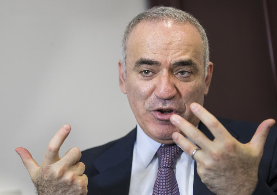 FILE - Prominent Russian opposition figure and chess champion Garry Kasparov speaks in an interview with The Associated Press at the conclusion of the fifth Vilnius Russia Forum at the Esperanza hotel in Trakai district,some 50 kms (31 miles) west of the capital Vilnius, Lithuania, Friday, May 25, 2018.Most Russian opposition figures are either in prison at home or are in exile abroad. But they vow that they will still put up a fight against President Vladimir Putin as he seeks yet another term in office in an election scheduled for March. (AP Photo/Mindaugas Kulbis, File)