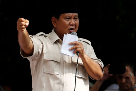 FILE PHOTO: Indonesia's presidential candidate Prabowo Subianto speaks to his supporters after this week's presidential election in Jakarta, Indonesia, April 19, 2019. REUTERS/Willy Kurniawan/File photo