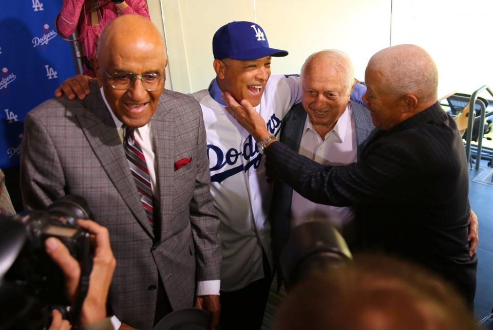 Don Newcombe, from left, Dave Roberts, Tommy Lasorda and Maury Wills at Dodger Stadium in 2016