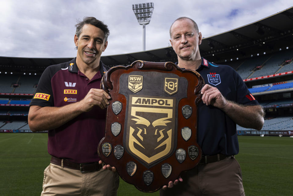 QLD Maroons head coach Billy Slater and NSW Blues head coach Michael Maguire pose with the trophy.