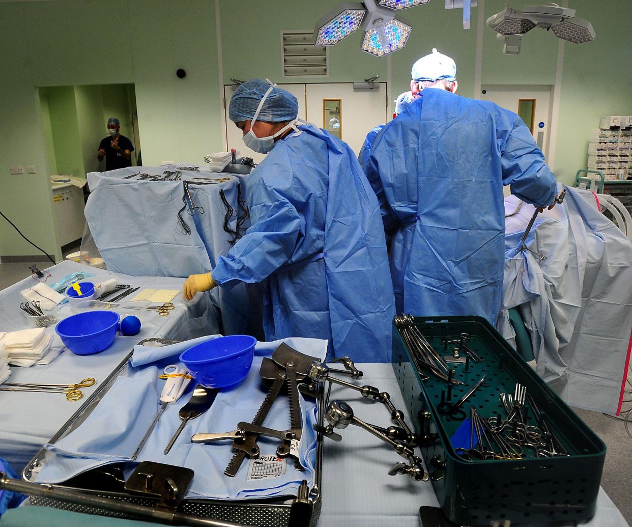 Undated file photo of a surgery taking place. Almost one in three female surgeons working in the NHS have been sexually assaulted in the last five years, according to a new survey. Eleven instances of rape were reported by surgeons who took part in the study, published in the British Journal of Surgery. Issue date: Tuesday September 12, 2023.