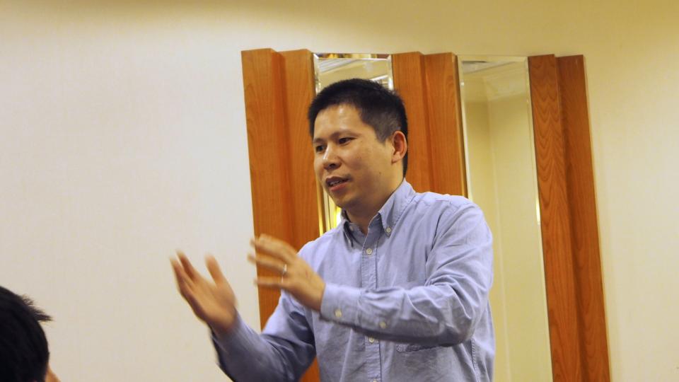 Handout photo of Chinese rights advocate Xu Zhiyong speaking during a meeting in Beijing