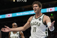 Milwaukee Bucks center Brook Lopez (11) reacts to play against the Atlanta Hawks during the first half of an NBA basketball game, Saturday, March 30, 2024, in Atlanta. (AP Photo/Mike Stewart)