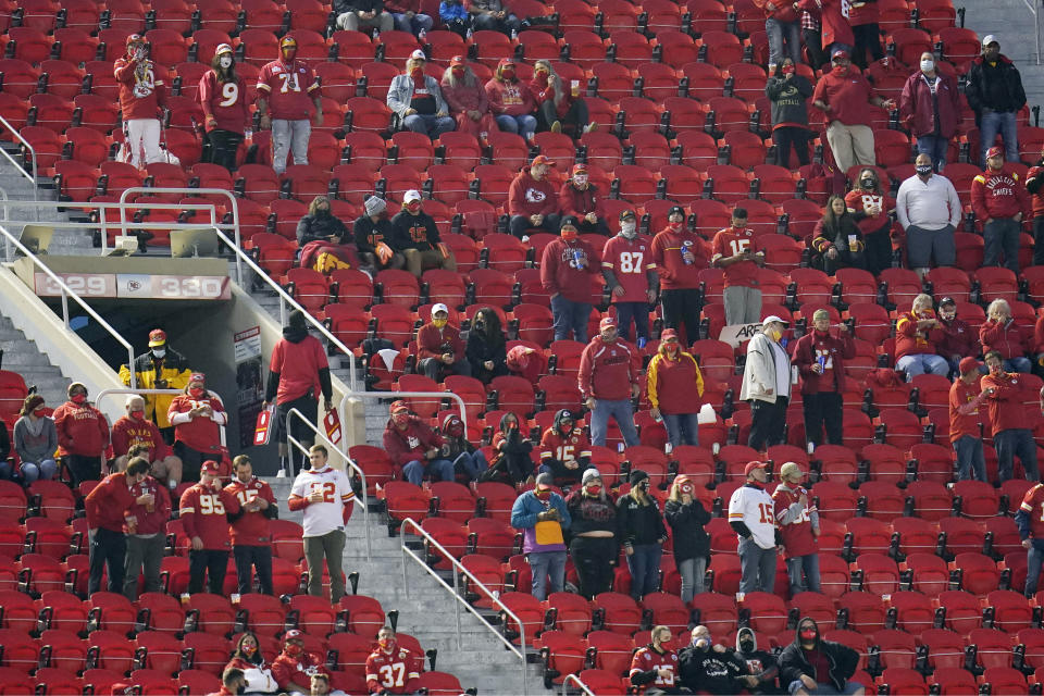 FILE- In this Thursday, Sept. 10, 2020, file photo, fans watch during the first half of an NFL football game between the Kansas City Chiefs and the Houston Texans in Kansas City, Mo. Ten fans who attended the Chiefs game last week have been told to quarantine after one fan tested positive for COVID-19, Kansas City health officials announced Thursday, Sept. 17, 2020. (AP Photo/Jeff Roberson, File)